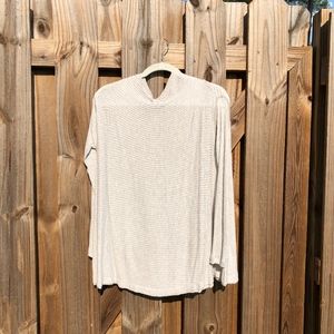 light gray long sleeved top